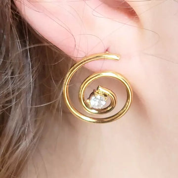 Boucles d’oreilles spirales dorées en acier inoxydable avec strass brillant
