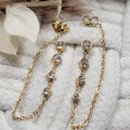 Boucles d’oreilles dorées pendantes avec strass élégants – bijou femme acier inoxydable