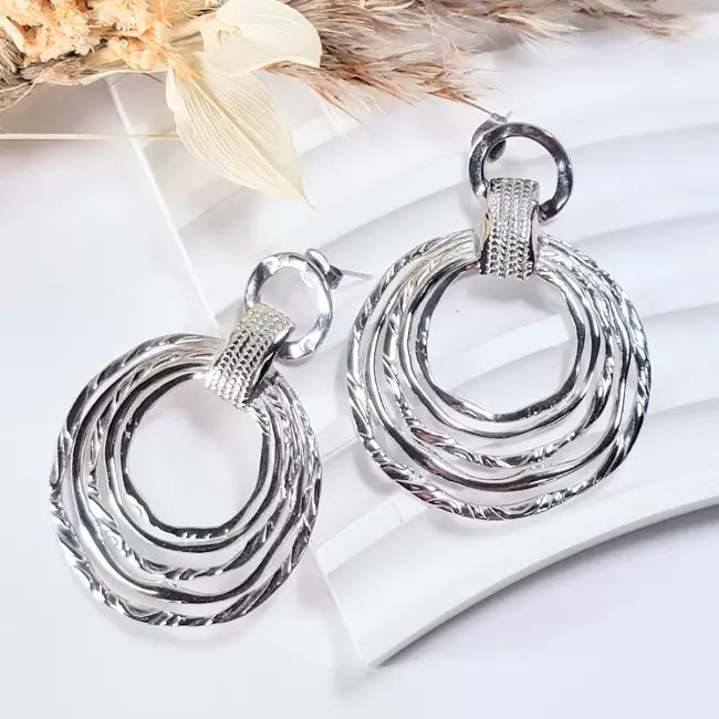 Boucles d’oreilles mode argentées pour femme – design rond élégant en acier inoxydable