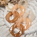 Boucles d’oreilles maillons acétate tons beige et caramel – Bijou fantaisie estival