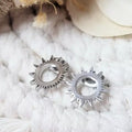 Paire de boucles d’oreilles soleil argentées bohème chic en acier inoxydable