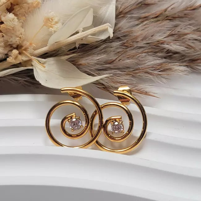 Boucles d’oreilles spirales dorées en acier inoxydable pour femme élégante