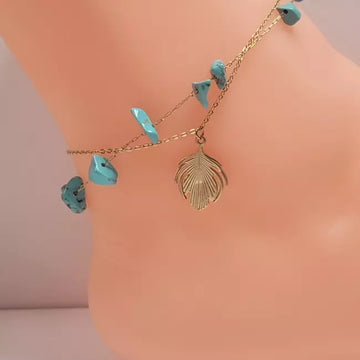 Bracelet de cheville doré double rang avec pierres turquoise et pendentif feuille