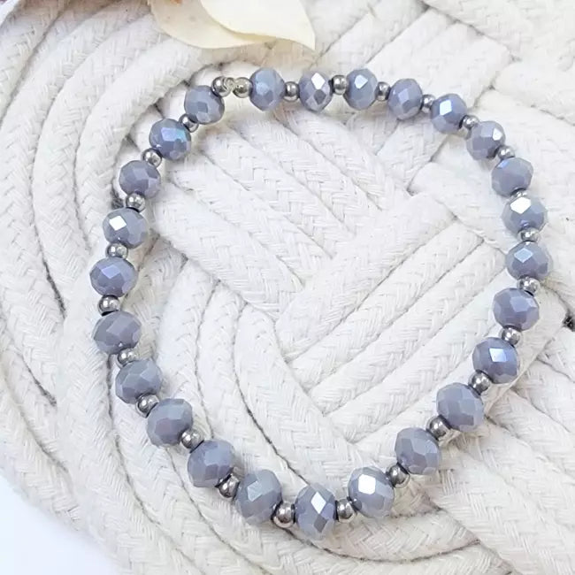 Bracelet élastique femme perles facettées beige et acier inoxydable