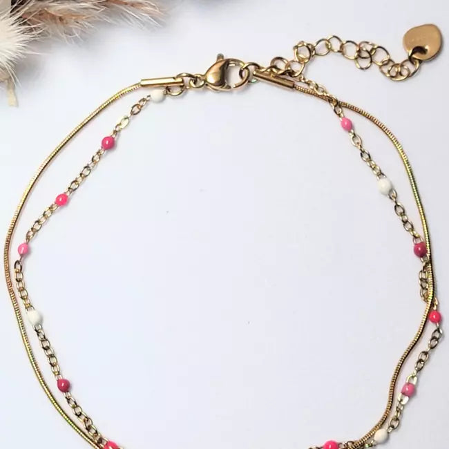 Chaîne de cheville femme en acier inoxydable doré avec petites perles blanches