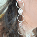 Boucles d’oreilles argentées pendantes à cercles et pastille