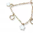 Chaîne de cheville dorée avec fleurs blanches en acier inoxydable
