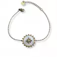 Bracelet doré en acier inoxydable avec médaillon rond en nacre et étoile centrale sertie – bijou raffiné au style solaire et bohème